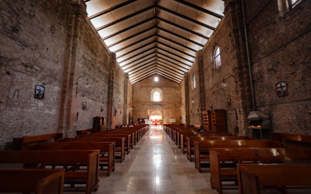 Beautiful interior view of a historic church in Huauchinango, Mexico, showcasing its architecture and spiritual ambiance